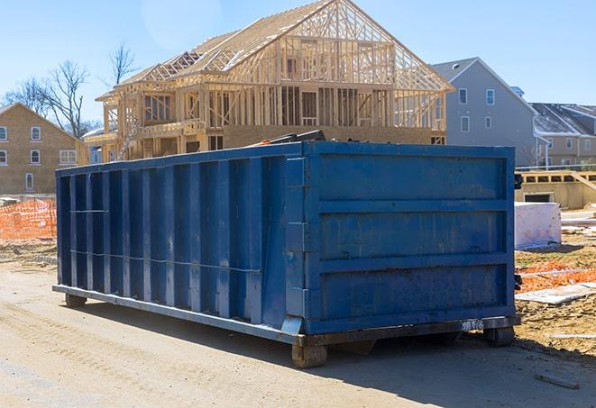 a well-organized waste management display using residential dumpsters